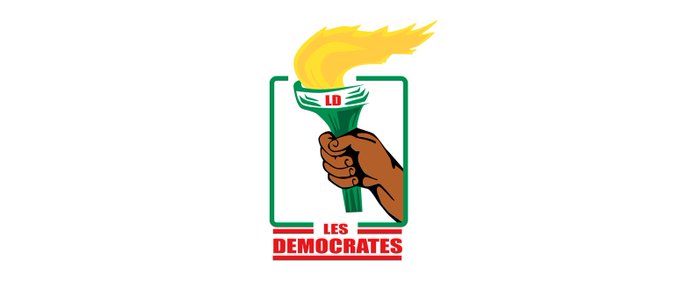 Une main tenant une torche allumée avec un encadrement vert et le texte les democrates en rouge en dessous