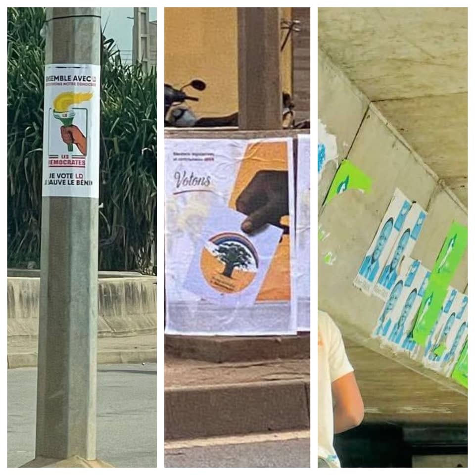 Affiches électorales collées sur un poteau électrique, un mur en bord de trottoir et un mur sous un pont routier